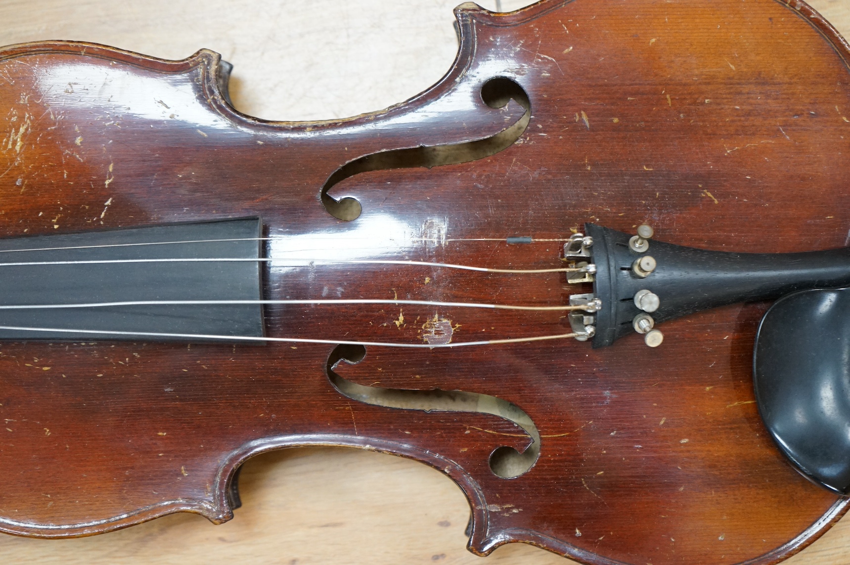 A cased violin, label to interior reads ‘Dulcis et Fortis’, back 36cm. Condition - scratches